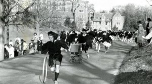 The hoop race tradition for Wellesley seniors has evolved from a "first to marry" expectation for the winner to "first CEO" (in the 1980s). These days, the winner just gets major bragging rights. (Photo from college archives via Boston Globe)
